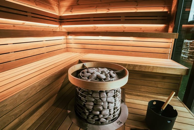Wooden sauna interior with tiered benches